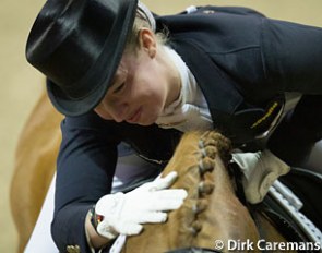 Fabienne Lutkemeier rewarding her horse at the end of her ride at the 2015 World Cup Finals in Las Vegas :: Photo © Dirk Caremans
