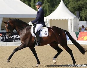 Claudia Rüscher and Florina at the 2015 World Young Horse Championships :: Photo © LL-foto