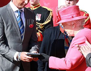 Carl Hester receives the BHS Queens Award for equestrianism by Her Majesty Queen Elizabeth II :: Photo © Risto Aaltonen