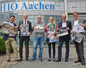 2015 Silver Camera Award winner Leanjo de Koster (centre) with the judging panel and finalist photos for the 2016 silver camera award