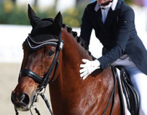 Joanne Vaughan pats her 17-year old Danish warmblood Elmegardens Marquis (by Michellino x Lucky Light)