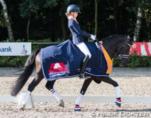 Robin Heiden and Oosterbroek Fenix win the 4-year old division at the 2016 Dutch Young Pony Championships :: Photo © Hilde Dokter