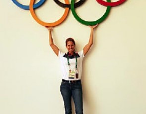 Dominican Republic's Yvonne Losos de Muniz with the Olympic rings in Rio