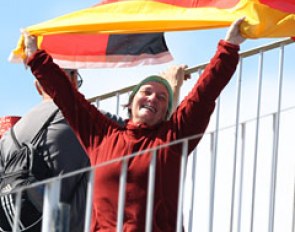 Barbara Schnell waving the German flag