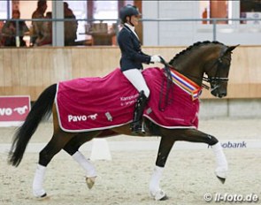 Emmelie Scholtens and Fenix win the inaugural 6-year old division at the 2016 Pavo Cup Finals :: Photo courtesy KWPN