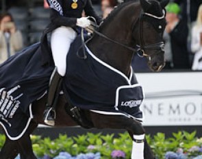 Dorothee Schneider and Sezuan win their third World Young Horse Champion's title
