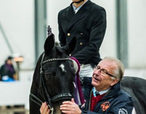Swedish judge Gustav Svalling patting Filip Kowalski's Saviola