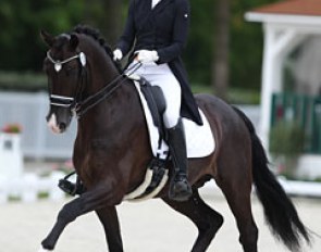 French Maeva Hoang on the 11-year old Dutch warmblood stallion Blacktime (by Painted Black x Goodtimes). This horse has been marked as having French JO/JEM team potential.