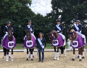 The French team with Pierre Volla, Arnaud Serre, Ludovic Henry, and Nicole Favereau win the 2917 CDIO Hickstead Nations Cup