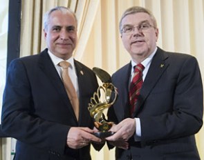 IOC President Thomas Bach (right) paid tribute to equestrian sport when presenting FEI President Ingmar De Vos with the IOC President’s Trophyduring the annual FEI Sports Forum 2017 :: Photo © Richard Juilliart