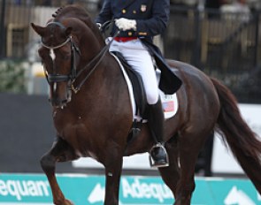 Jan Ebeling on Rassolini. This liver chestnut stallion with his big cresty neck is an eye catcher. The horse still needs to develop more self carriage and balance in the piaffe and passage though. Work in progress
