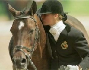 A big kiss for her gold medal winning pony