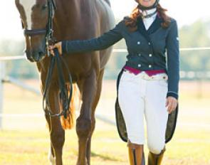 Angelea Walkup and her 11-year old Sir Donnerhall offspring in hand :: Photo © Michael Tacket