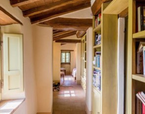Library followed by a walk-in closet leading to the main bedroom