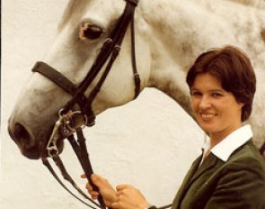 Sissy Max-Theurer, in her 20s, holding her Olympic Gold medal winning horse Mon Cherie