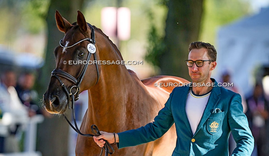 Jayden Brown trotting up Quincy B at the 2024 Paris Olympic Games :: Photo © Astrid Appels