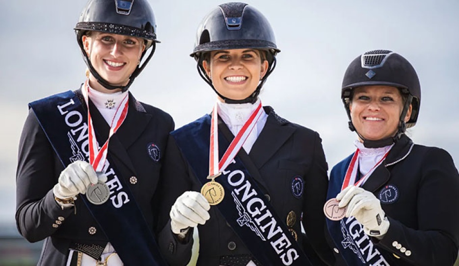 The Grand Prix podium with Rogerson, Neuhauser and Eggenberger at the 2025 Swiss Dressage Championships :: Photo © Saskia Melina for Swiss Equestrian