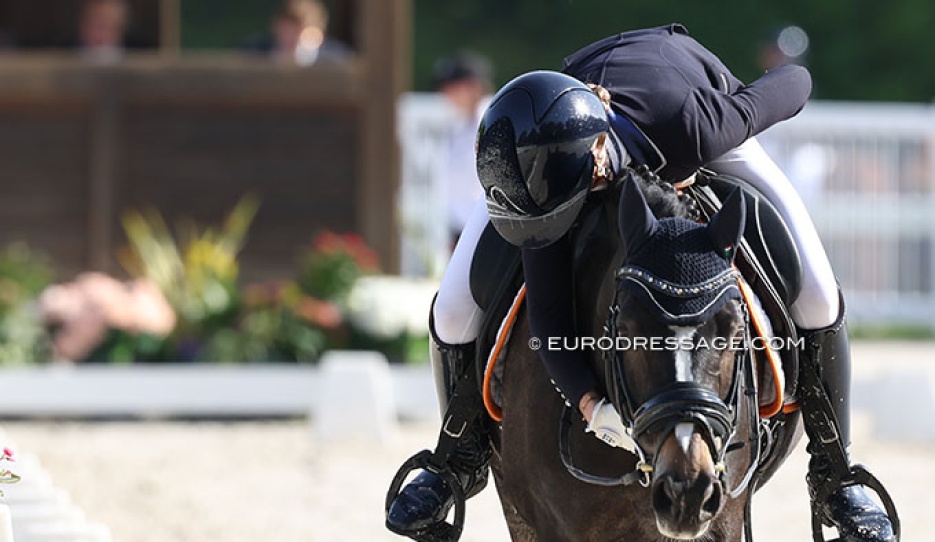 Rider hugging pony at an international competition :: Photo © Astrid Appels