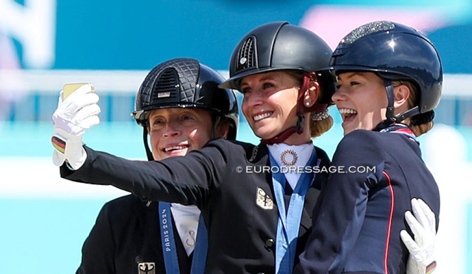 The three 2024 Olympic individual medal winners taking a selfie on the podium :: Photo © Astrid Appels