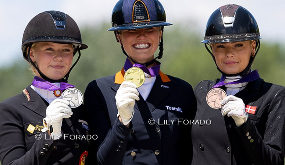 The individual podium with Schmitz-Heinen, Van Nek and Skovsager at the 2026 European Young Riders Championships :: Photo © Lily Forado