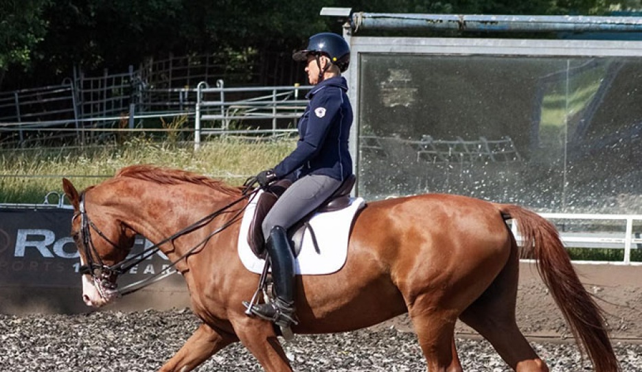 Uta Gräf demonstrating a proper giving of the reins on an S-level horse :: Photo © Luna Mühlfeit