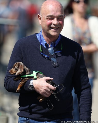 Silvia Rizzo's life partner and former Italian eventing team trainer Michele Betti with dachs puppy Tic Tac