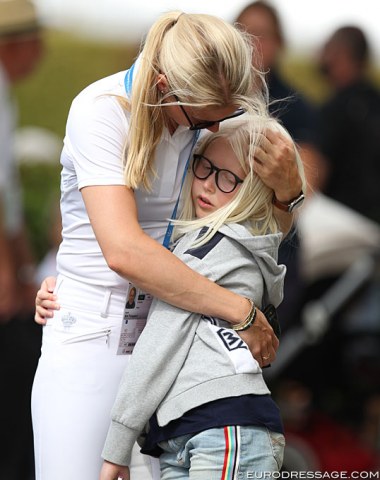 Agnete Kirk Thinggaard cuddles with her daughter