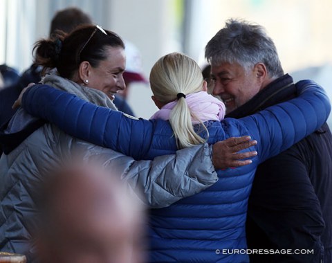 Valentina's parents Nicole and Frank Pistner hug trainer Stefanie Kerner