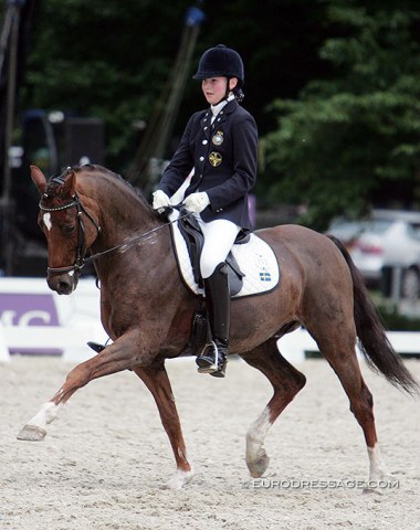 Marina Mattsson on ChampagnerSwedish Grand Prix and professional dressage rider Marina Mattsson in her pony time on Champagner (by Constantin x Lungau)