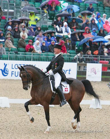 Pläge and Regent in the rain at the 2009 European Dressage Championships in Windsor