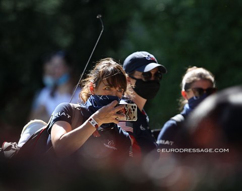 Jessica Eaves Mathews snaps a photo of her daughter Katherine leaving the arena