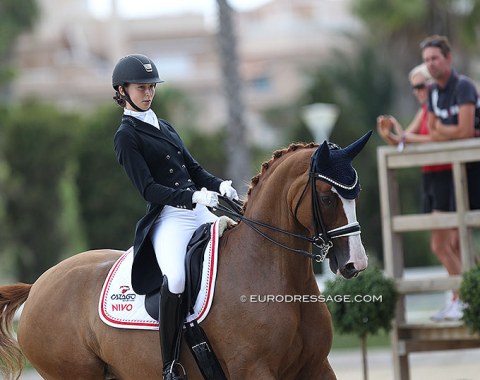 Denmark's Victoria Bonefeld Dahl on Comtesse with her mom as well as team trainer Dennis Fisker in the background
