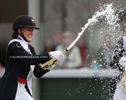 Cathrine Dufour is the first to start the champagne shower