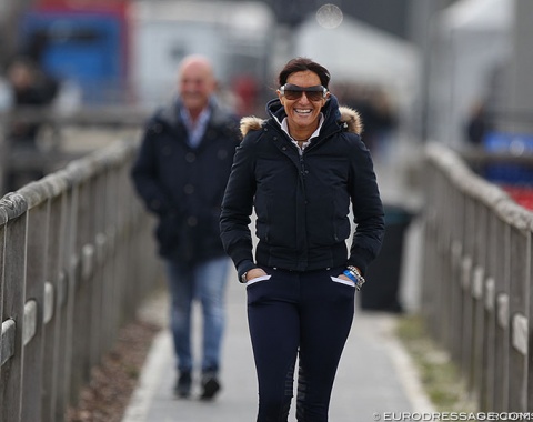 Italian Grand Prix rider Silvia Rizzo. Her partner Michele Betti (a former Italian eventing team trainer) in the background