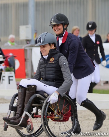 France’s benjamin Chiara Zenati speeding up Barbara Minneci’s wheelchair to get to the prize-giving of grade III.