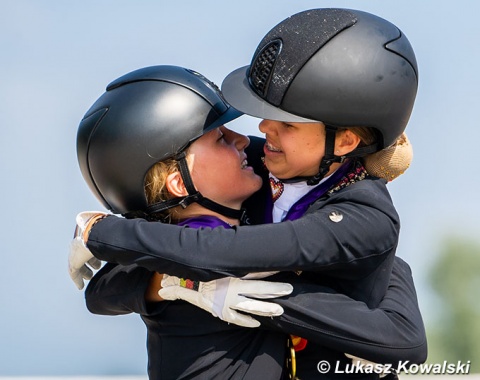 Martha Raupach hugs team mate Lotta Plaas