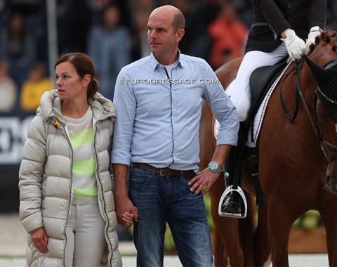 Beck's' breeder and owner Christian Thelker holding hands with his wife