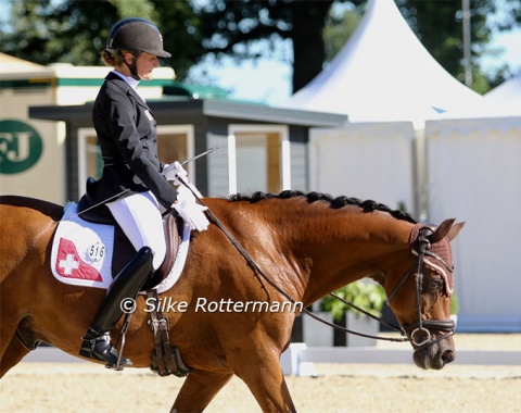 Sole Swiss rider in the para Europeans, Nicole Geiger and the 18-year-old KWPN bred gelding Amigo leave the arena.