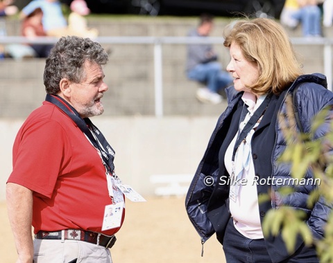 Canadian national coach Clive Milkins in conversation with Genevieve Pfister from Switzerland