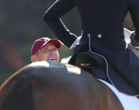 Trainer Guenter Seidel touching base with his student Anna Buffini after her test