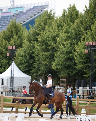 Becky Moody and Jagerbomb. The huge stadium in the background