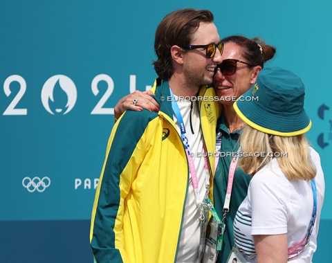 Mysterious Star's owner Stephanie Goller in tears in the arms of Simone Pearce's boyfriend, Swiss show jumper Martin Fuchs