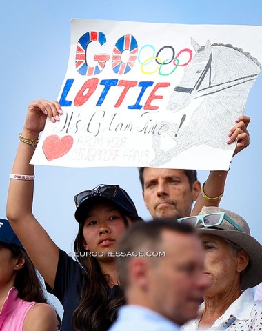 A Singaporean fan salutes Lottie Fry and Glamourdale with a sign