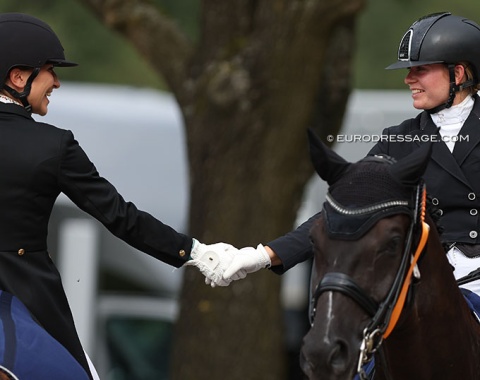 Schurmann and Eger shake hands