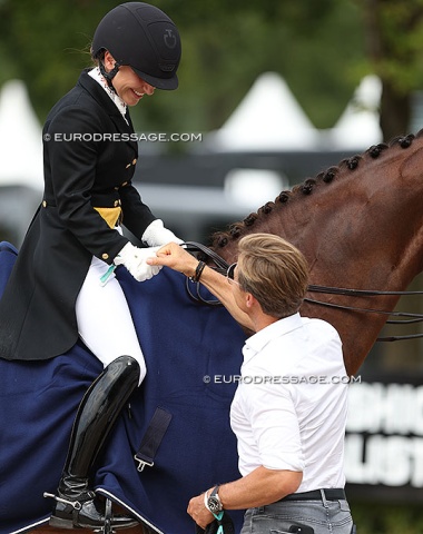 Schurmann and Claude Niedner fist bumping