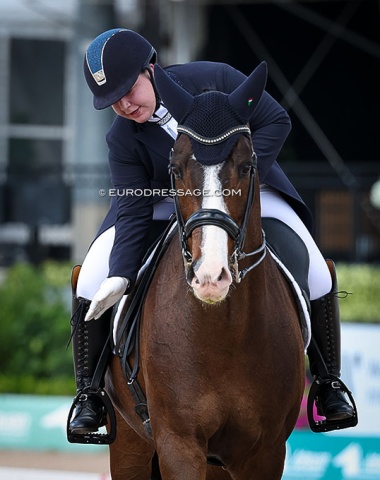 Under 25 rider Emma Luersman pats Jaristo