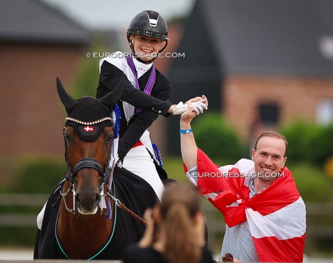 Danish Michella Skovsager on Blue Hors Zampalo, flanked by her coach Maik Kohlschmidt