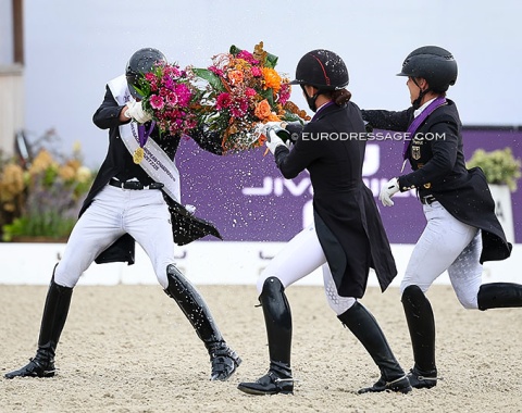 Being chased with champagne by two seasoned medal winners