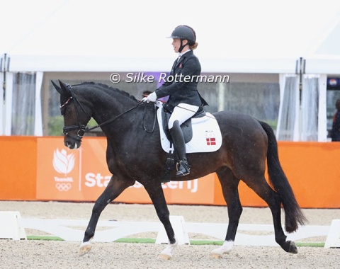 Individual silver for the Danish pair Katrine Bjelke Kristensen and Quarter who braved theweather conditions.