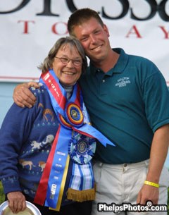 Scot Hassler hugs his employer Jane McElree of Hilltop Farm after winning trophies and ribbons at the 2005 Devon Breed Show :: Photo © Mary Phelps
